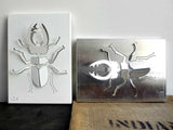 Raw and white aluminum laser cut wall sculpture for indoors or outdoors decor